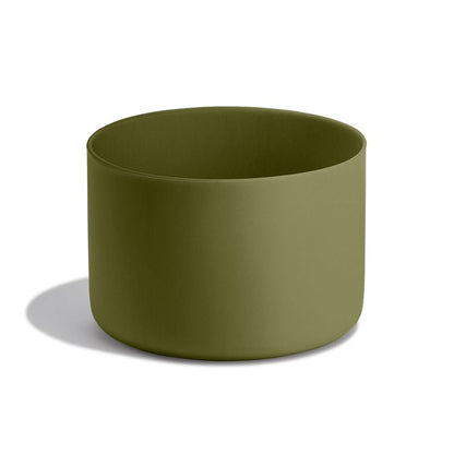 Small cylindrical Hydro Flask container in muted olive green with smooth matte surfaces, slightly rounded base, and open top. Minimalist design.