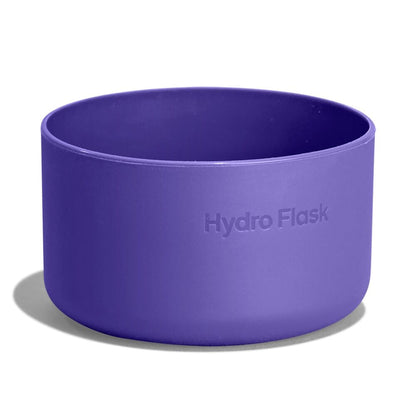 Purple Hydro Flask silicone cup or sleeve with smooth matte finish, straight sides, rounded rim, and "Hydro Flask" embossed on the exterior.