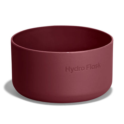Maroon Hydro Flask silicone bowl with smooth rounded sides, matte finish, and embossed brand name on exterior. Studio lighting on white background.
