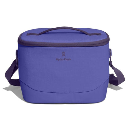 Purple Hydro Flask soft-sided cooler bag with oval zippered lid, matching top handle, detachable shoulder strap with plastic hardware, and smooth structured body.